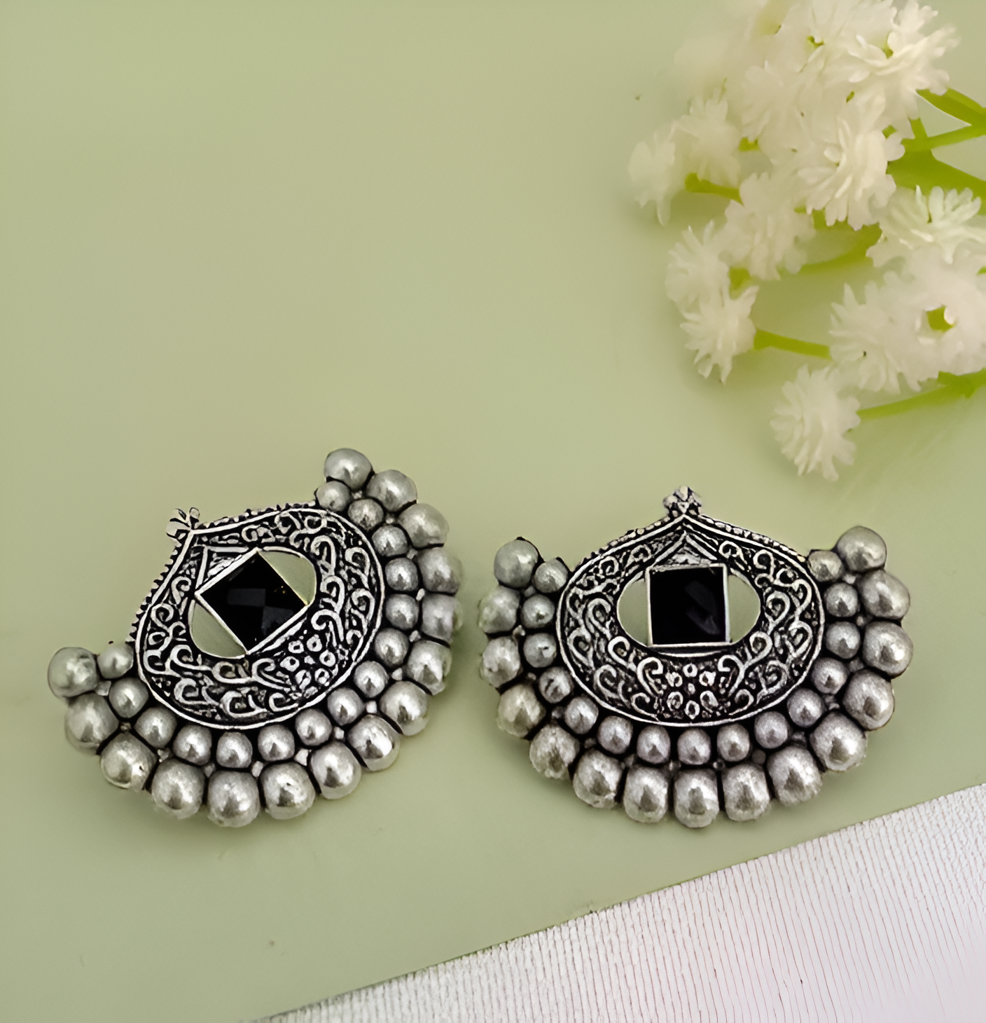 Noir Tribal Crescent Studs
